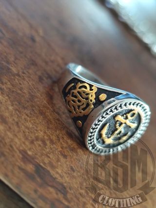 Anello con ancora dorata