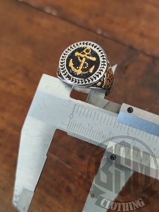 Anello con ancora dorata