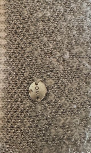 Sciarpa con fili argentati