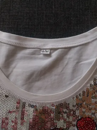 Maglia bianca con paillettes