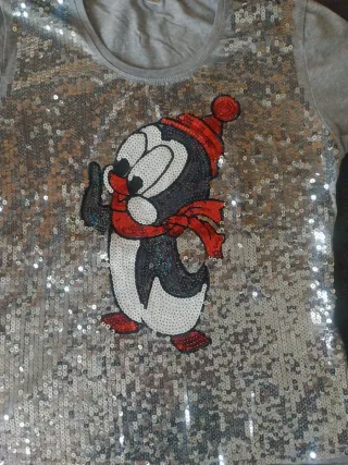 Maglia grigia con paillettes