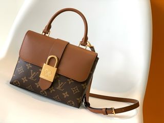 Louis Vuitton Marrón yDorada