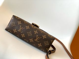 Louis Vuitton Marrón yDorada