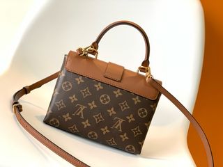 Louis Vuitton Marrón yDorada