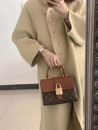 Louis Vuitton Marrón yDorada