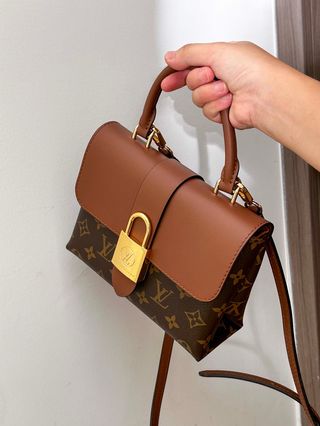 Louis Vuitton Marrón yDorada