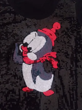 Maglia nera con paillettes