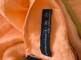 Blusa naranja-coral sin mangas