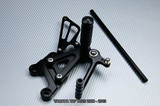 Estriberas retrasadas YAMAHA YZF R125 2009 - 2013