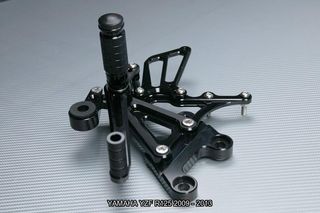 Estriberas retrasadas YAMAHA YZF R125 2009 - 2013