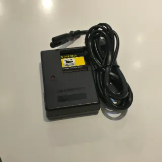 Caricabatterie Olympus e batteria nuova