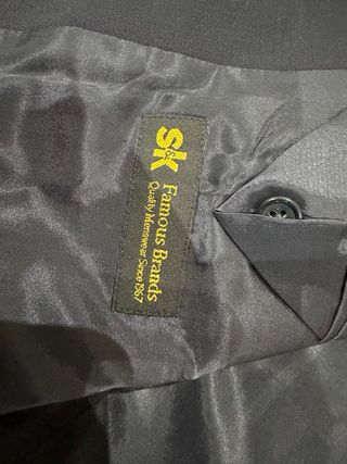 Americana azul con botones dorados