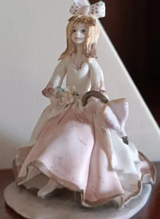 Profumiere in vetro con tappo e statuine