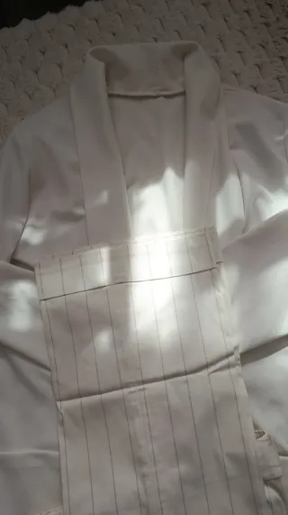 Conjunto americana y pantalón blanco