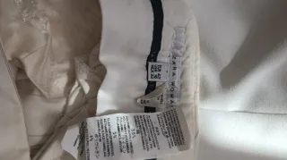 Conjunto americana y pantalón blanco