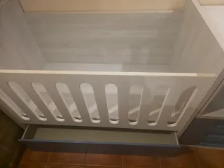 Cuna convertible con cambiador