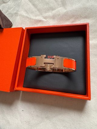 Pulsera Hermes H Naranja y Dorada 17 cm