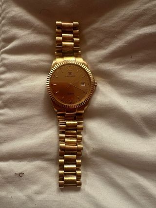 Reloj Yacare de oro de 18k
