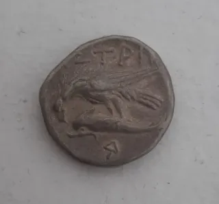 Moneda antigua con doble cara