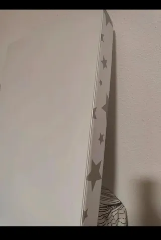 Cambiador acolchado para bebé con estrellas