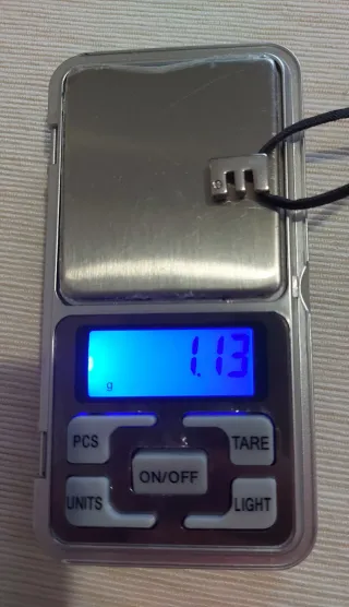 Ciondolo lettera E oro bianco 750..18kt con diaman