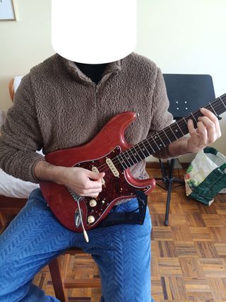 Supporto ergonomico per chitarra elettrica