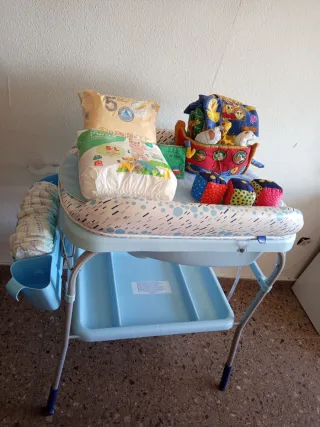 Cambiador Chicco + 51 pañales + juguetes