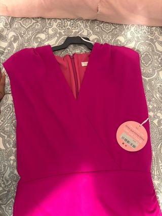 Vestido largo fucsia con abertura