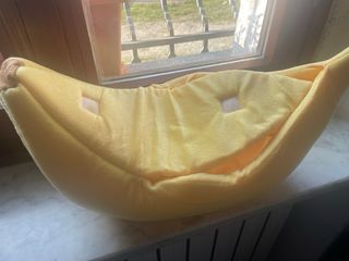 Piccola cuccia a forma di banana