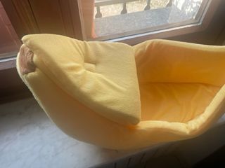 Piccola cuccia a forma di banana