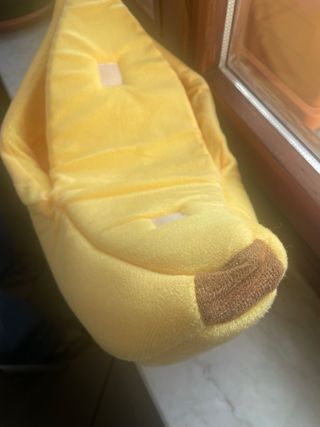 Piccola cuccia a forma di banana