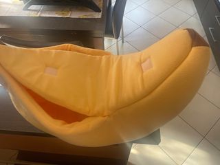 Piccola cuccia a forma di banana