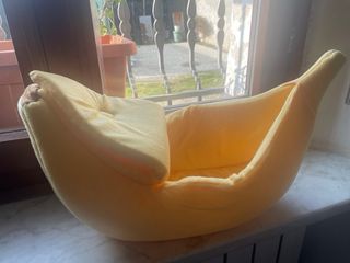 Piccola cuccia a forma di banana