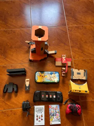 Nintendo Switch + Accesorios y Juegos
