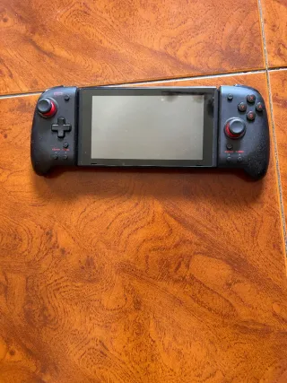 Nintendo Switch + Accesorios y Juegos