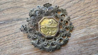 Medalla relicario oro y plata