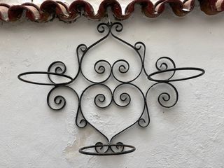Maceteros de hierro forjado para pared