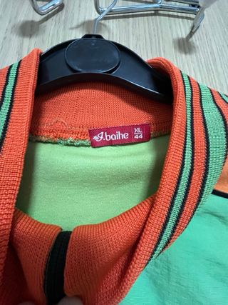 Conjunto chándal verde y naranja