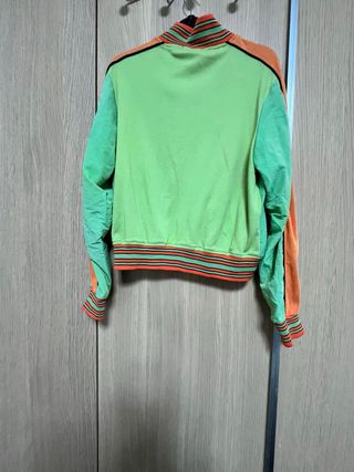 Conjunto chándal verde y naranja