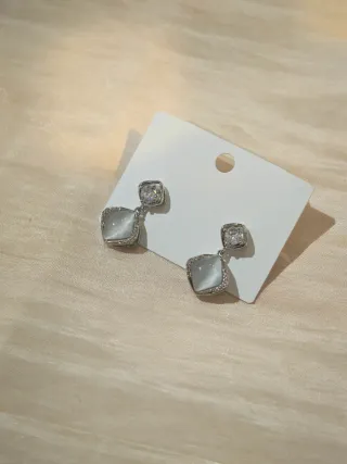 Orecchini pendenti geometrici occhio di gatto