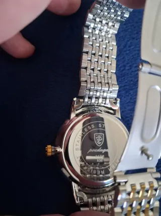 Reloj Poedagar Negro y Dorado Nuevo