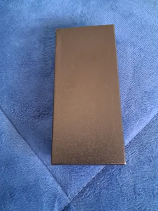 Reloj Poedagar Negro y Dorado Nuevo