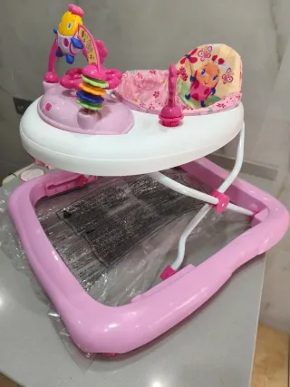 Bright Starts caminador Rosado bebe