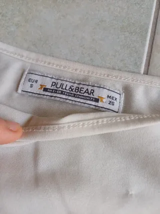 Top bianco con spalline