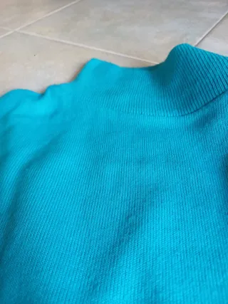 Maglia calda collo alto maniche corte