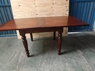 Mesa de comedor extensible de madera
