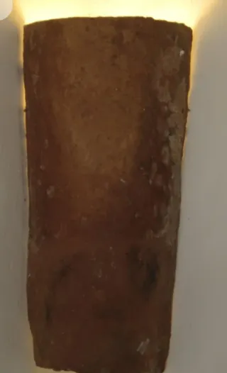 Teja antigua de barro