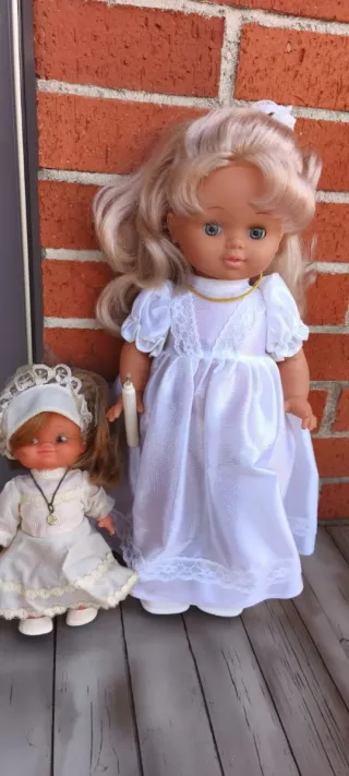 Due bambole antiche per la comunione