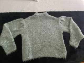 Jersey verde plateado con mangas abullonadas