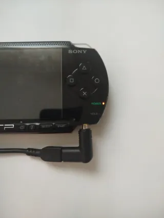 NO REBAJO PSP 1004 + Cargador + SD + Juego